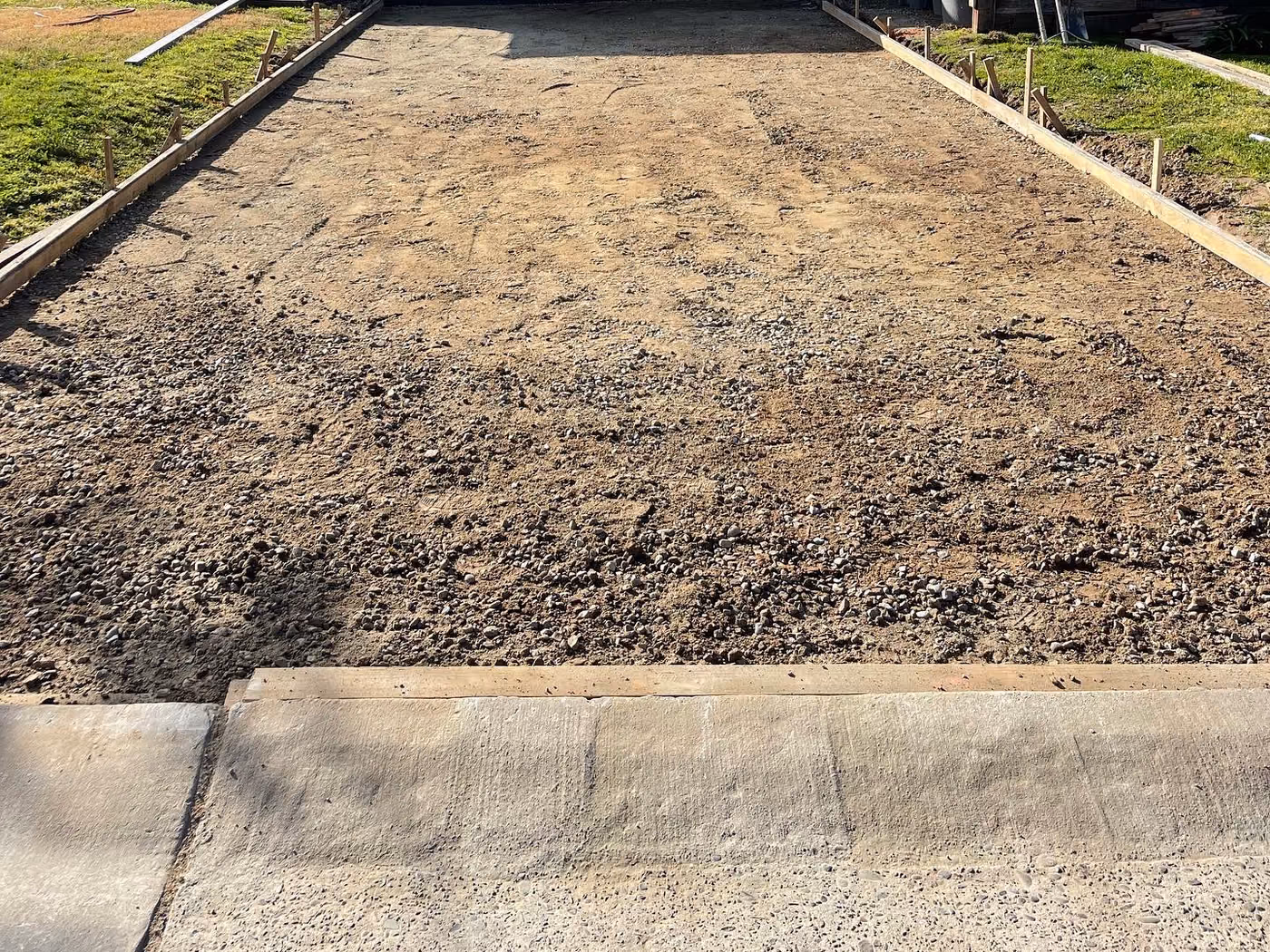 Driveway excavated to depth and graded before the pour