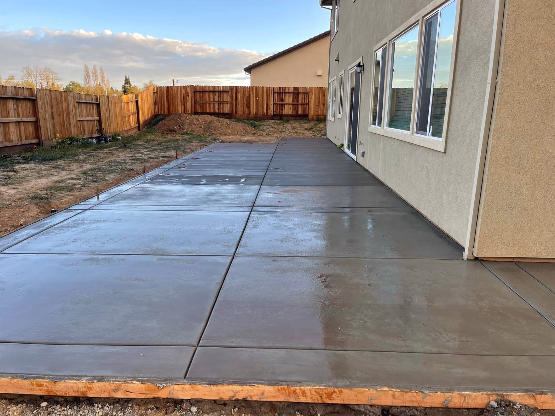 Finished concrete patio in a Sacramento back yard
